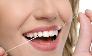 does flossing create gaps in teeth