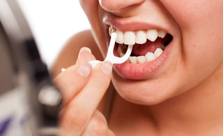 Can Flossing Cause Gum Recession?
